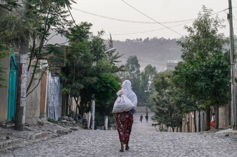 A woman carrying a USAID bag on June 18, 2021 in Mekelle, the capital of Ethiopia's Tigray region.