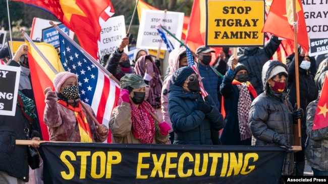 FILE - A group from the Tigrayan diaspora in North America protest about the conflict in Ethiopia, near the State Department, on Dec. 22, 2021, in Washington.