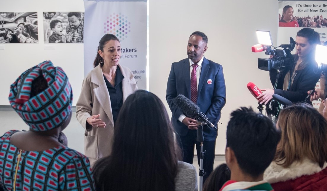 Ibrahim Omer with NZ Prime Minister Jacinda Ardern. 