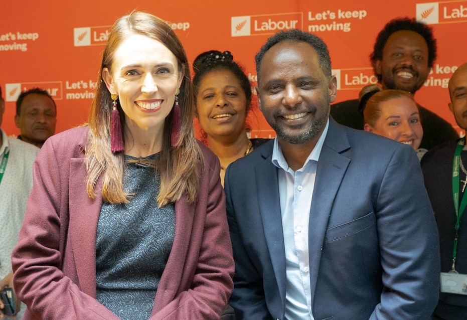 Ibrahim Omer with NZ Prime Minister Jacinda Ardern. 