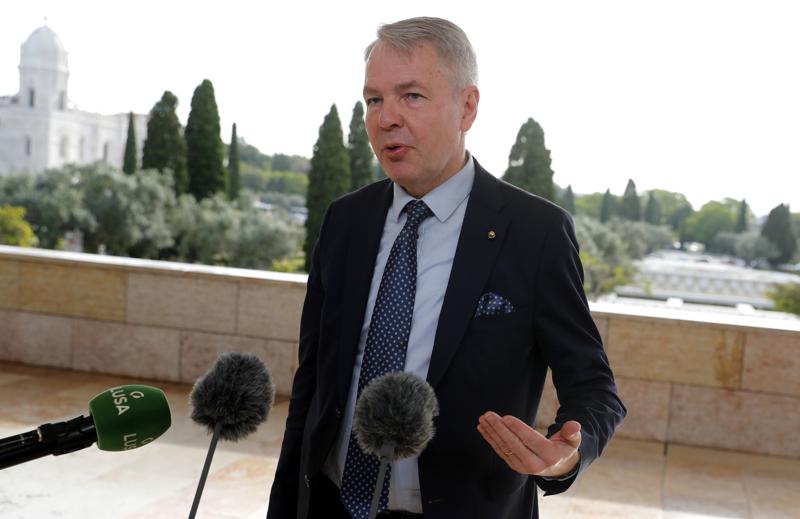 FILE - In this Thursday, May 27, 2021 file photo, Finland's Foreign Minister Pekka Haavisto speaks with the media in Lisbon. A European Union envoy says Ethiopia’s leaders told him in closed-door talks earlier this year that “they are going to wipe out the Tigrayans for 100 years.” The envoy, Pekka Haavisto, Finland's foreign minister, says such an aim “looks for us like ethnic cleansing.” Haavisto spoke in a question-and-answer session Tuesday, June 15 with a European Parliament committee. (AP Photo/Armando Franca, file)